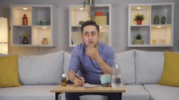 The forgetful man is solving puzzles. video