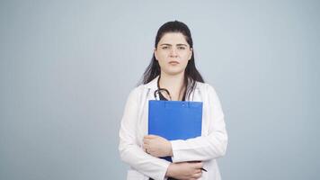 The doctor looks at the camera with a plain expression. video