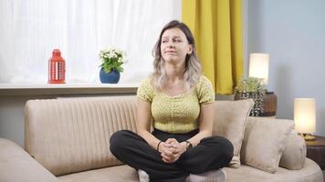 Worried and nervous woman at home watching outside. video