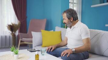 A middle-aged man who doesn't want to take pills. video