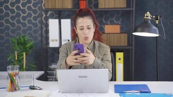 Business woman liking mobile application from phone. video