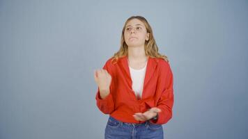 Woman calming herself by doing breathing exercises. video