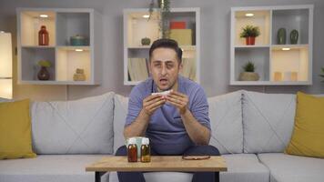 Man covering his mouth and nose while coughing. video