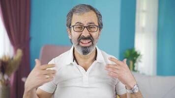 A middle-aged man who is overwhelmed by the heat. video