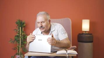 Man joyfully embracing laptop. video