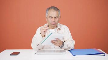 Man with notebook thinks and takes notes. video