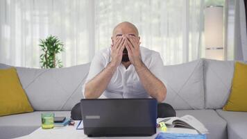 Home office worker man making cute gesture at camera. video