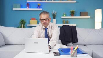 Home office worker man says shhh to camera. video