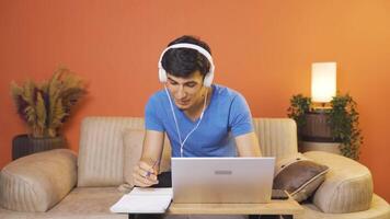 Man working on laptop with happy expression. video