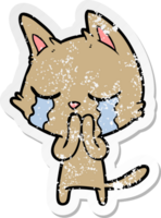 distressed sticker of a crying cartoon cat png