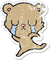 distressed sticker of a crying cartoon bear running away png