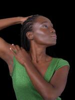 Young African American woman in green dress photo