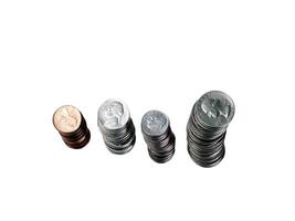 Carmichael, CA, 2007 - Four Stacks of US Coins on White Background photo