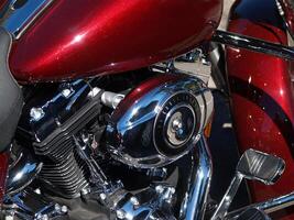 Portland, OR, 2008 - Red and chrome closeup detail of motorcycle photo