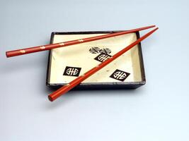 japonés plato y picar palos foto