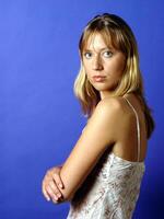 Young Caucasian Woman Portrait  against Blue photo