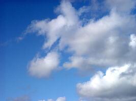 White Cumulus Clouds In Blue Sky photo