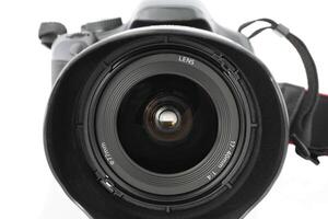 Closeup of wide angle zoom lens on camera photo