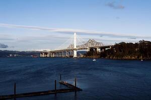 San Francisco, CA, 2014 - Old And New San Francisco Bay Bridge photo