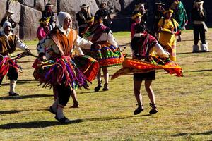 Cusco, Peru, 2015 - Men And Women Dancing In Traditional Costumes Cusco Peru photo