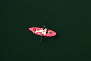 Folsom, CA, 2010 - Woman in red kayak and bikini from above photo