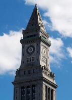 Boston, MA, 2008 - Clock Tower High Rise Building Against Blue Sky photo