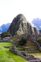 Machu Picchu, Peru, 2015 - South America Inca Stone Ruins And Tourists photo