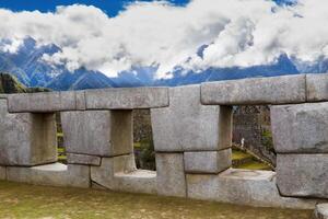 Machu Picchu, Peru, 2015 - Three Windows With View Of Mountains And Clouds photo