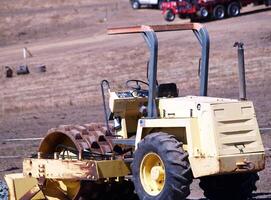 Point Reyes, CA, 2009 - Heavy Earth Moving Equipment Idle In Field photo