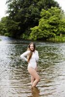 Teen Caucasian Woman Outdoor Standing In River photo