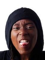African American Woman Making Face With Tongue Out Wearing Hood photo