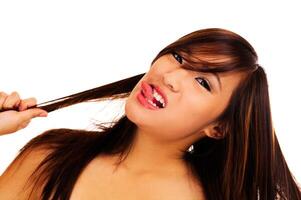 Extreme Facial Expression Portrait Young Asian American Teen photo