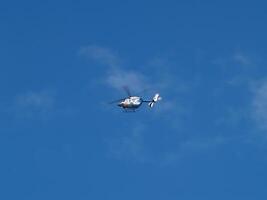 Boston, MA, 2008 - Medical Helicopter Blue Sky White Clouds photo