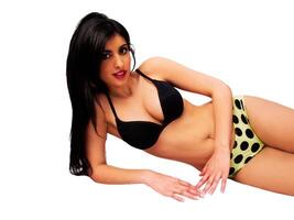 Reclining Middle Eastern Woman In Bra And Panties photo