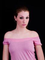 Attractive Caucasian Woman With Pink Shirt Off Shoulder photo