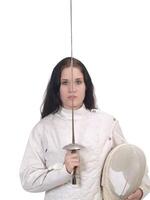 Young Woman in Fencing Jacket with Foil and Mask photo