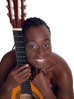 Young black woman portrait with accustical guitar photo