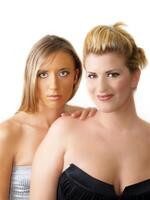 Two blond women bare shoulder portrait white photo