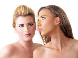 Portrait of two blond women bare shoulders photo