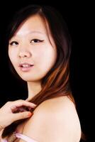 Over The Shoulder Portrait Attractive Chinese Woman photo