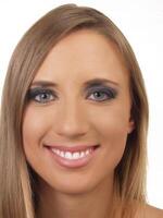 Tight Indoor Portrait Caucasian Woman Smiling On White photo