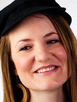 Tight Portrait Of Caucasian Woman In Black Hat photo