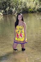 Young Attractive Asian American Woman Yellow Dress photo