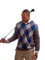 Young black man in sweater with golf club photo