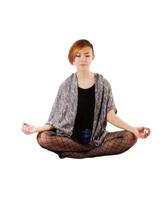 Asian American Woman Sitting In Lotus Position photo