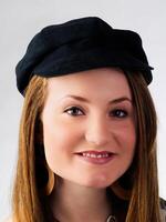 Young Caucasian Woman Portrait Wearing Black Hat photo