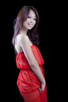 Smiling Attractive Asian American Woman Orange Dress photo