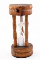 Egg timer hour glass in wooden frame photo