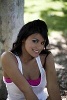 Smiling outdoor portrait young hispanic teen girl photo