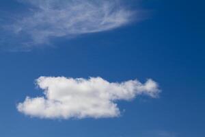 Two types of white clouds in blue sky photo